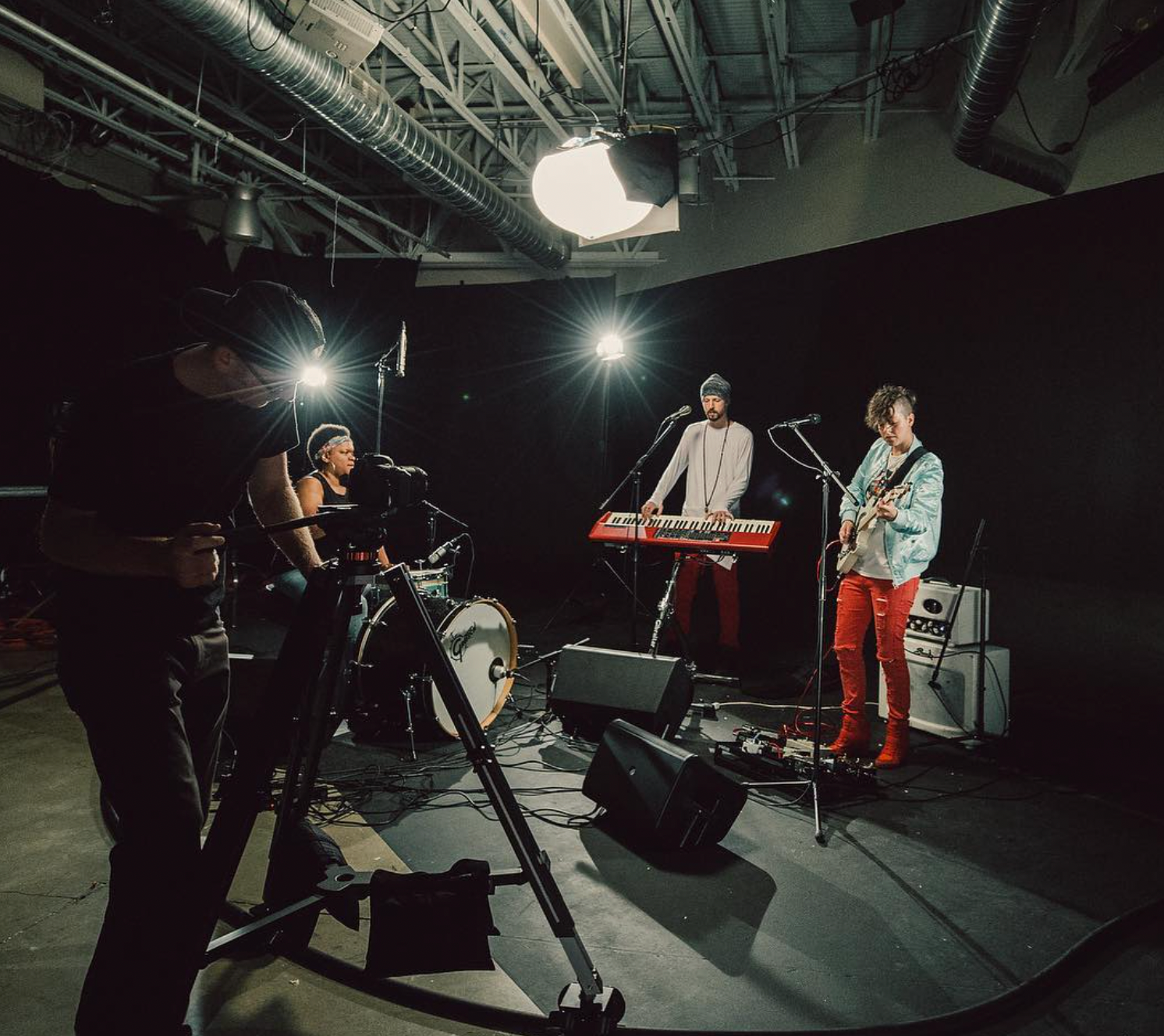 Band working together in a studio